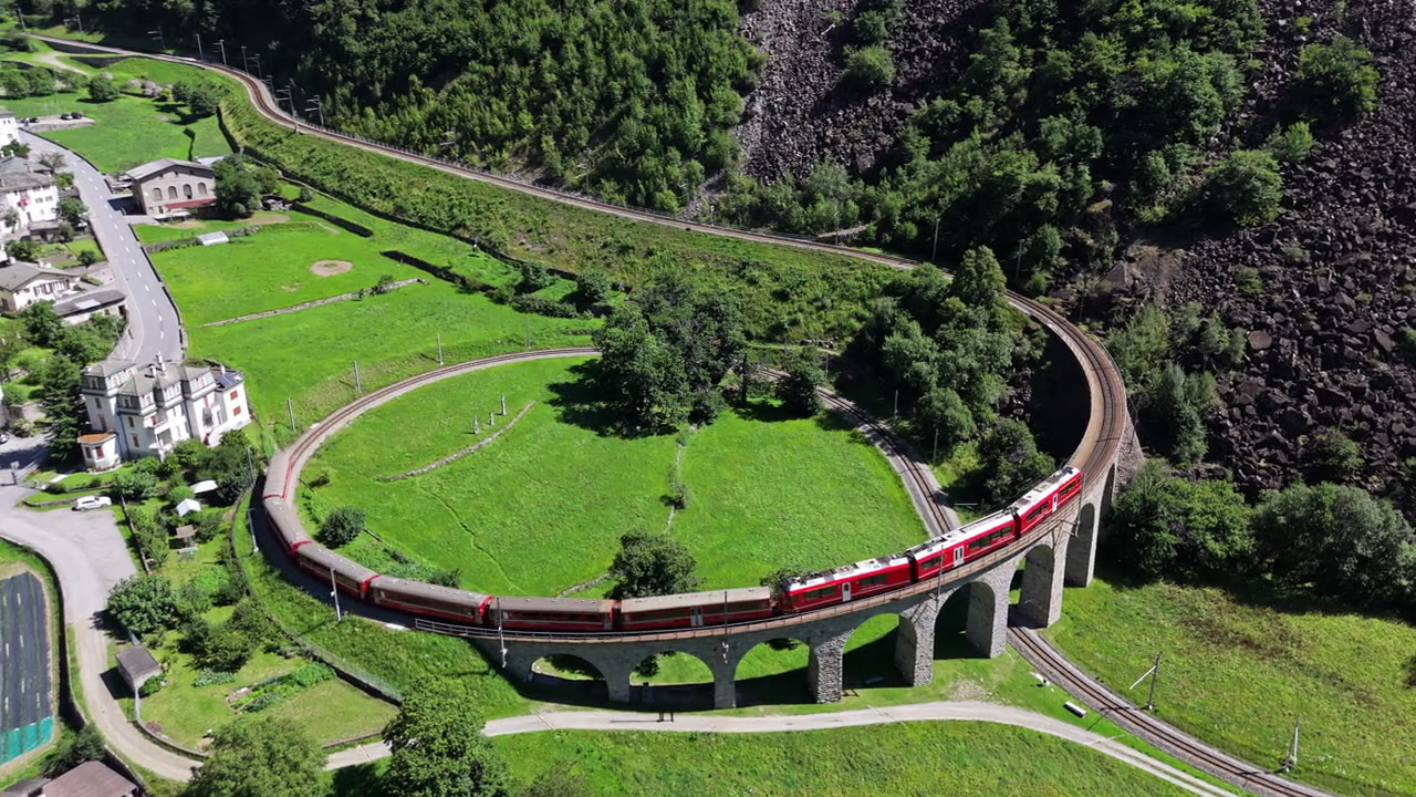 The Bernina Express curling around the Brusio spiral viaduct